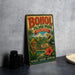 A vintage-style metal sign for BOHOL ISLAND PARK, Philippines, featuring an illustration of a tropical landscape with a bird, palm tree, and hibiscus flower.