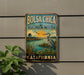 A vintage-style metal sign for the Bolsa Chica Ecological Reserve in California, featuring a bird and a sunset landscape.