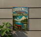 A vintage-style metal sign for Brudenzell River Provincial Park, featuring a canoe and a scenic landscape.