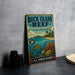 A vintage-style metal sign for the Buck Island Reef National Monument, featuring a tropical beach scene with a turtle, coral, and other marine life.