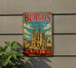 A vintage metal sign with the text "BURGOS CATHEDRAL SPAIN" and an illustration of the Burgos Cathedral, a famous landmark in Spain.