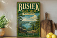 A vintage-style sign for Busiek State Forest in Missouri, featuring a scenic landscape with a lake and mountains.