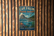 A vintage metal sign for Cape Falcon Marine Reserve, featuring a scenic landscape with a mountain, ocean, and various marine life.