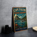 A vintage metal sign for Cape Falcon Marine Reserve, featuring a scenic illustration of the ocean and mountains.