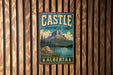 A vintage-style metal sign for Castle Provincial Park in Alberta, Canada, featuring a mountain landscape and a lake.