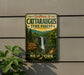 A vintage-style metal sign welcoming visitors to the Cataraeus State Forest in New York, featuring a scenic image of a waterfall surrounded by lush greenery.