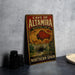 A vintage metal sign advertising the "Cave of Altamira" and the "Paleolithic Cave Art" in Northern Spain.