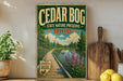 A vintage-style sign for the Cedar Bog State Nature Preserve in Ohio, featuring a scenic landscape with a wooden path, trees, and a body of water.