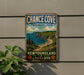 A vintage-style metal sign for Chance Cove Provincial Park, New Brunswick, Labrador, featuring a scenic coastal landscape with cliffs, a beach, and a lighthouse.