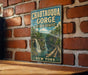 A vintage-style metal sign for Chautauqua Gorge State Forest in New York, featuring a scenic illustration of the gorge with a waterfall and train tracks.