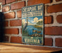 A vintage-style sign for Chesapeake Bay National Estuarine Research Reserve, featuring a heron and ducks in a serene landscape.