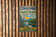 A vintage metal sign for Cienaga Grande de Santa Marta Biosphere Reserve in Colombia, featuring a blue heron, a boat, and a scenic landscape.