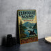 A vintage-style sign for Clayoquot Sound, a wildlife reserve in Canada, featuring a black and white orca whale in the foreground and a mountainous landscape in the background.