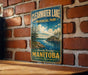 A vintage metal sign for Clearwater Lake, located in Manitoba, Canada.