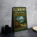 A vintage-style metal sign for Clemmons Educational State Forest in North Carolina, featuring a scenic image of a forest and a sign that says "Learn Discover Conserve".