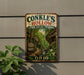 A vintage-style sign for Conkle's Hollow State Nature Preserve in Ohio, featuring a scenic image of a forest and a hiking trail.