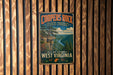 A vintage-style metal sign for the Coopers Rock State Forest in West Virginia, featuring a scenic landscape with a mountain, river, and pine trees.