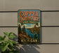 A vintage-style metal sign for Copper Country State Forest in Michigan, featuring a scenic landscape with a river, mountains, and pine trees.