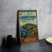 a vintage-style sign for Corvo Island, Portugal, with a bird perched on a cliff overlooking the ocean.