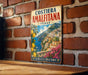 A vintage-style metal sign with a colorful illustration of a coastal town, featuring buildings, flowers, and a body of water.