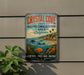 A vintage-style metal sign for Crystal Cove State Marine Conservation Area in California, featuring a coastal landscape with a beach, ocean, and marine life.
