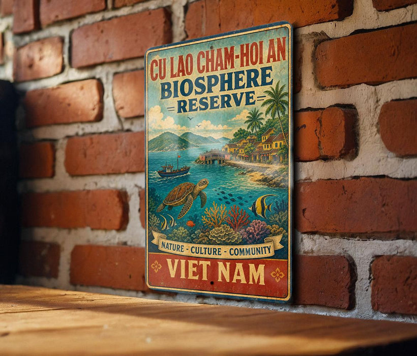 a vintage-style sign with a tropical beach scene, including a turtle, palm trees, and a boat, mounted on a brick wall.