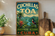 a vintage-style sign for the Cuchillas del Toa Biosphere Reserve in Cuba, with a tropical landscape and a bird perched on a branch.