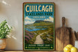 a vintage-style sign for Cuilcagh Lakelands Park, Ireland, with a scenic landscape of mountains, a lake, and a path leading through the grassy area.