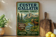 A vintage-style poster advertising Custer Gallatin National Forest, featuring a moose, mountains, and a river, is displayed on a wall next to a wooden cutting board and some potted plants.