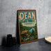 A vintage-style sign for the Dean State Forest in Ohio, featuring a scenic landscape with a lake and mountains.