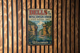 A vintage metal sign for the "Dells of the Wisconsin River State Natural Area" is displayed on a wooden wall.