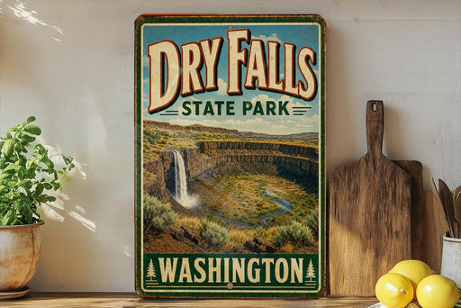 A vintage-style sign for Dry Falls State Park in Washington, featuring a scenic image of the falls and surrounding landscape.
