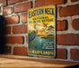 A vintage metal sign for the Eastern Neck National Wildlife Refuge in Maryland, featuring a blue heron and a sunset landscape.