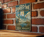 A vintage metal sign for the Edwin B. Forsythe National Wildlife Refuge in New Jersey, featuring a seagull and a lighthouse, is displayed on a brick wall.