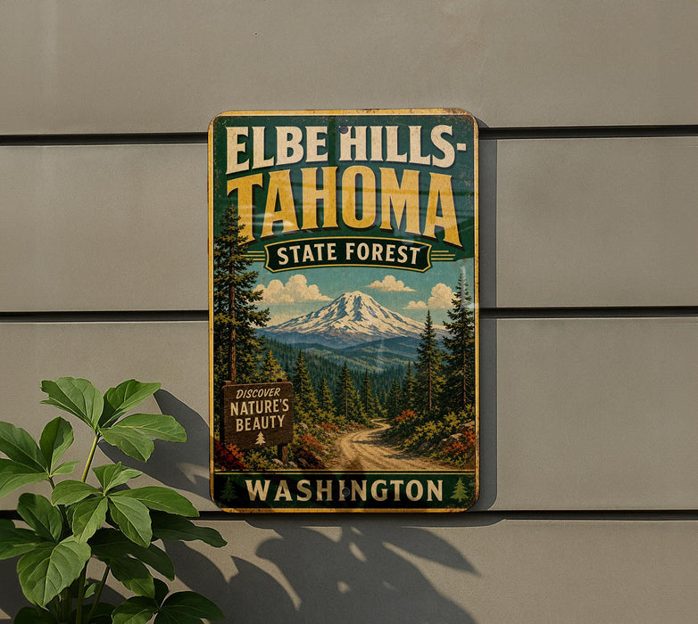 A vintage-style sign for Elbe Hills- Tahoma State Forest in Washington, featuring a mountain landscape and pine trees.