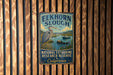 A vintage metal sign for the National Estuarine Research Reserve in California, featuring an illustration of a heron and a boat on a body of water.