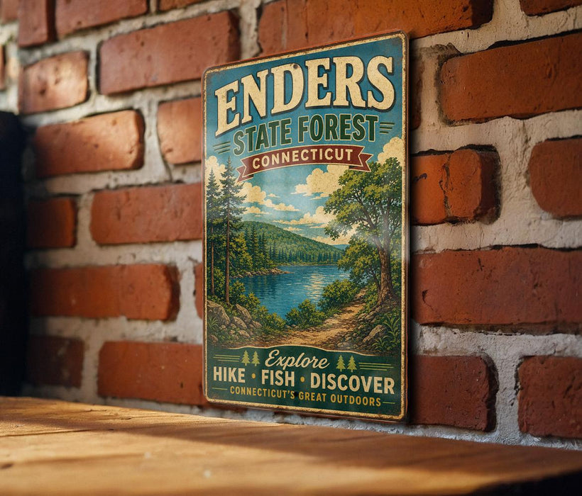 A vintage metal sign for Enders State Forest in Connecticut, featuring a scenic landscape with a lake and mountains.