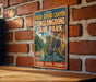 a vintage-style sign for the Echni Grand Canyon, Tenglongdong Cave Park, and the Echni Grand Canyon in Tibet, China.