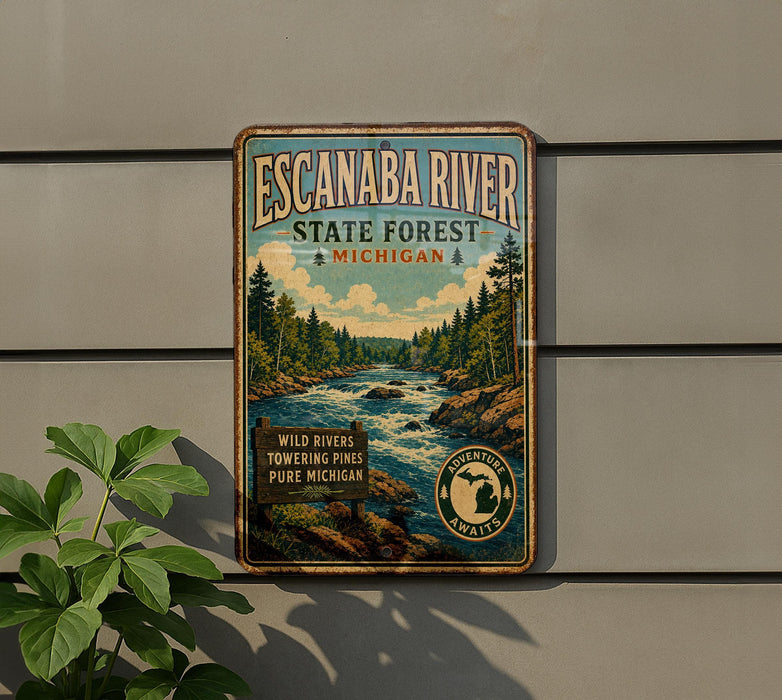 A vintage-style metal sign for Escanaba River State Forest in Michigan, featuring a scenic illustration of a river surrounded by pine trees and mountains.