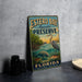 A vintage-style metal sign for Estero Bay Aquatic Preserve, featuring illustrations of various sea creatures and a serene underwater scene.