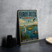 A vintage metal sign advertising "EVROS DELTA GREECE" with a scenic illustration of a bird, a boat, and a landscape.
