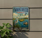 a vintage advertisement sign for Evros Delta Greece, depicting a seagull, a boat, and a scenic landscape.