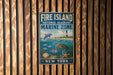 A metal sign for the Fire Island National Seashore Marine Zone, featuring illustrations of marine life such as a dolphin, turtle, and starfish, along with the text "FIRE ISLAND NATIONAL SEASHORE MARINE ZONE" and "NEW YORK".