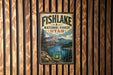 A vintage-style metal sign for Fishlake National Forest in Utah, featuring a scenic landscape with mountains, a lake, and pine trees.