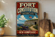a vintage-style sign for the Fort Constitution Historic Site in New Hampshire, with a picture of a cannon and a stone fort.