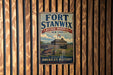 A vintage-style metal sign for the Fort Stanwix National Monument in New York, featuring an illustration of the fort and its surroundings.