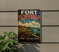A vintage-style metal sign for Fort Ticonderoga, New York, featuring a cannon, a ship, and a scenic landscape.
