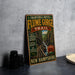 a vintage trail sign for Franconia Notch Flume Gorge Trail, which is located in New Hampshire. The sign is displayed on a table, with a stack of black camera lenses and a white dish visible to the side.
