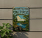 a vintage-style sign for the Freetown-Fall River State Forest in Massachusetts, with a scenic illustration of a forest and a river.