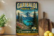 A vintage-style poster advertising Garibaldi Provincial Park in British Columbia, featuring a scenic mountain landscape with pine trees and a lake.